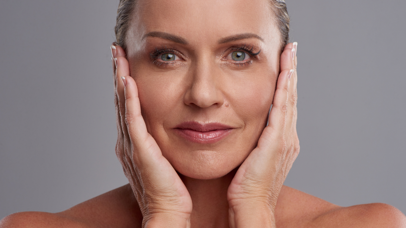 Close-up of a woman with bold makeup.