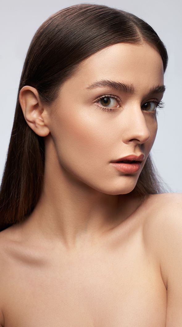 Portrait of a woman with smooth skin.